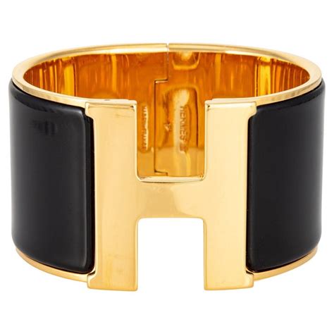 hermes black pm clic clac yellow gold fashionphile|hermes h bracelets.